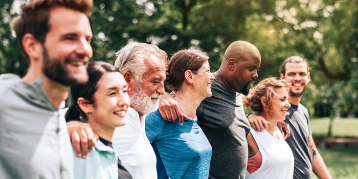 Diverse,Group,Of,People,Outdoors,,Smiling,And,Bonding.,Friends,Enjoying